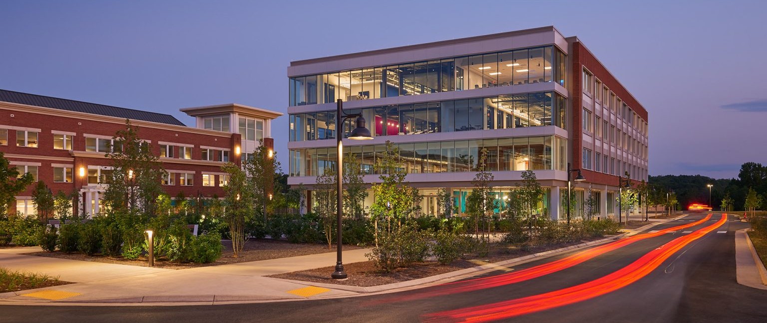 Multistory glass building in the evening